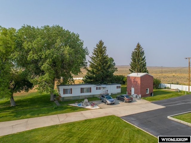 19A Kolman Ranch Rd, Rock Springs, WY 82901 - view of front facade featuring a front yard