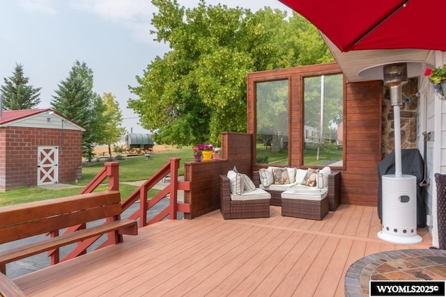 19A Kolman Ranch Rd, Rock Springs, WY 82901 - wooden deck featuring a lawn, an outdoor structure, and an outdoor living space