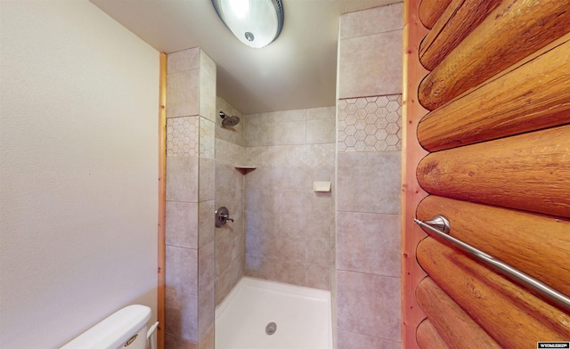 7 Raschell Ct, Lander, WY 82520 - full bathroom featuring a tile shower and toilet