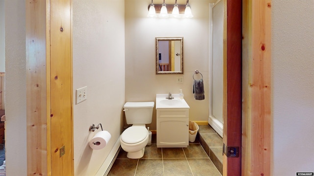 7 Raschell Ct, Lander, WY 82520 - full bathroom featuring tile patterned flooring, toilet, vanity, a stall shower, and baseboards