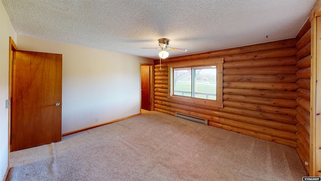 7 Raschell Ct, Lander, WY 82520 - carpeted spare room with a baseboard radiator, a textured ceiling, ceiling fan, and baseboards