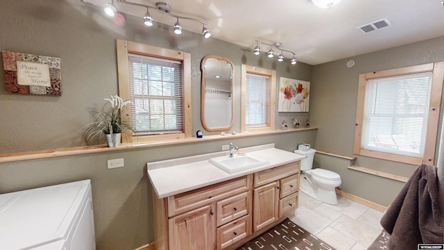 2908 Esterbrook Rd, Esterbrook, WY 82633 - bathroom with tile patterned floors, vanity, and toilet