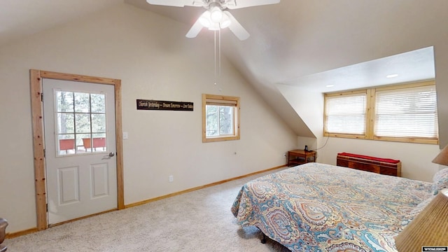 2908 Esterbrook Rd, Esterbrook, WY 82633 - carpeted bedroom featuring lofted ceiling, multiple windows, baseboards, and a ceiling fan
