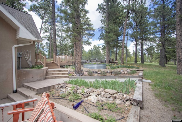 2908 Esterbrook Rd, Esterbrook, WY 82633 - view of yard featuring a wooden deck and stairway