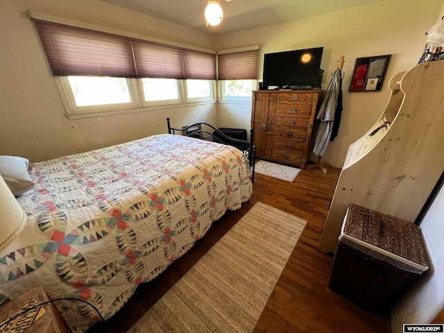 bedroom featuring wood finished floors
