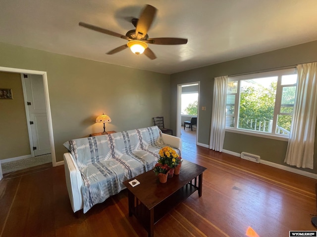 309 Cedar Ave, Kemmerer, WY 83101 - living area featuring baseboards, ceiling fan, and wood finished floors