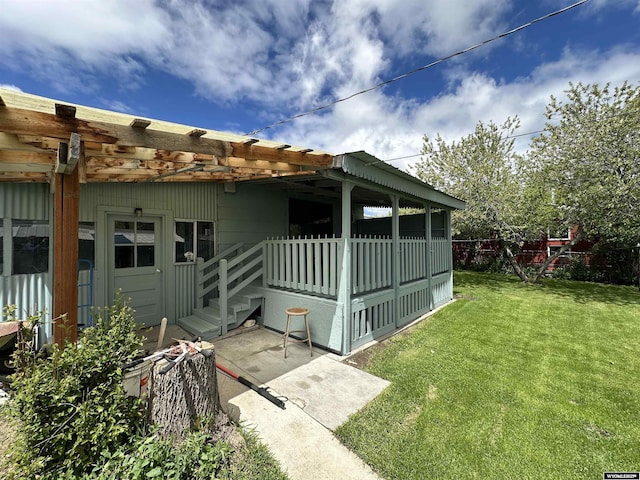 540 Smith, Lander, WY 82520 - back of property with a lawn and a pergola