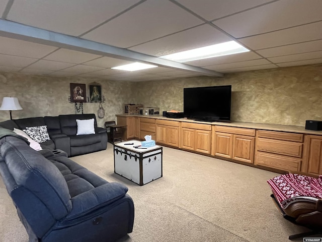 801 Circle Dr, Wheatland, WY 82201 - living room featuring a drop ceiling and light colored carpet