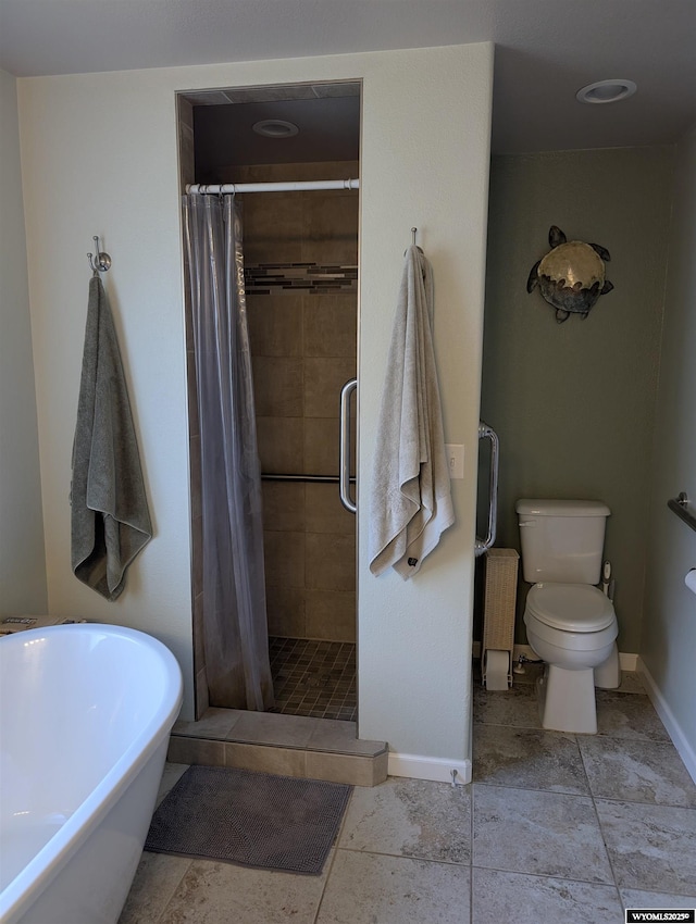 1206 E Park Ave, Riverton, WY 82501 - full bath with baseboards, a stall shower, a soaking tub, and toilet
