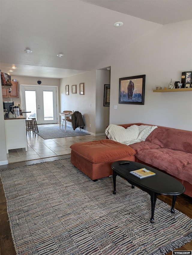 1206 E Park Ave, Riverton, WY 82501 - tiled living area with french doors, baseboards, recessed lighting, and lofted ceiling