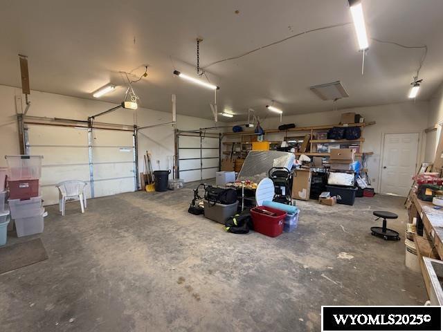 221 Fir St, Buffalo, WY 82834 - garage featuring a garage door opener