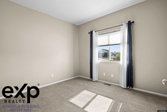 2521 Sagewood Ave, Casper, WY 82601 - carpeted empty room with baseboards