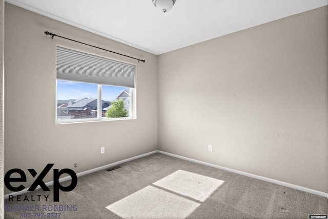 2521 Sagewood Ave, Casper, WY 82601 - carpeted empty room with baseboards