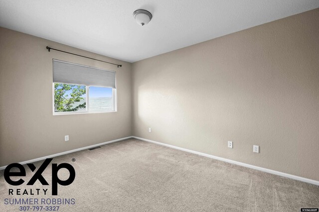 2521 Sagewood Ave, Casper, WY 82601 - empty room featuring carpet and baseboards