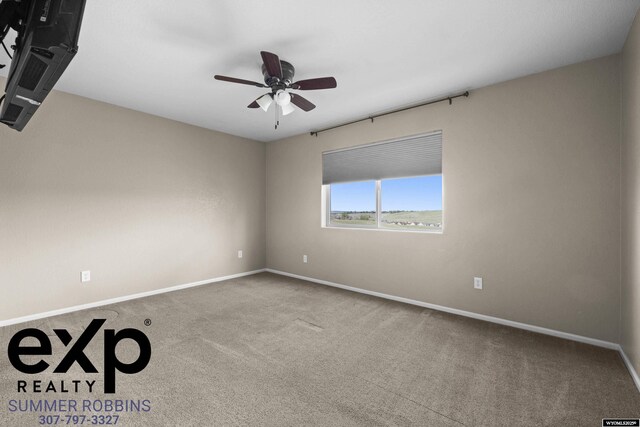 2521 Sagewood Ave, Casper, WY 82601 - carpeted empty room featuring a ceiling fan and baseboards