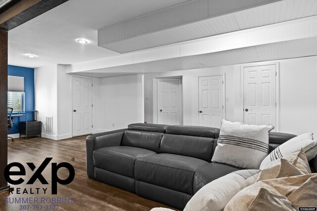 2521 Sagewood Ave, Casper, WY 82601 - living room with dark wood-style flooring and baseboards