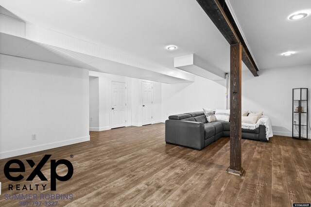 2521 Sagewood Ave, Casper, WY 82601 - living room with wood finished floors, baseboards, beam ceiling, and recessed lighting