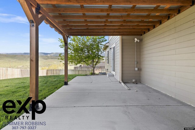 2521 Sagewood Ave, Casper, WY 82601 - view of patio with a mountain view