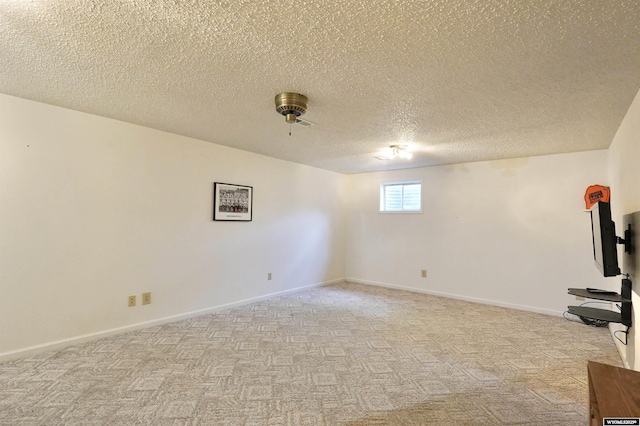 4451 S David St, Casper, WY 82601 - basement with light carpet, a textured ceiling, and baseboards