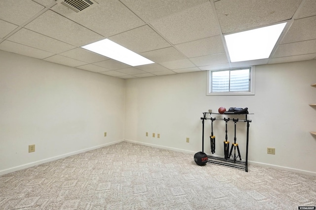 4451 S David St, Casper, WY 82601 - below grade area with a drop ceiling, carpet flooring, and baseboards