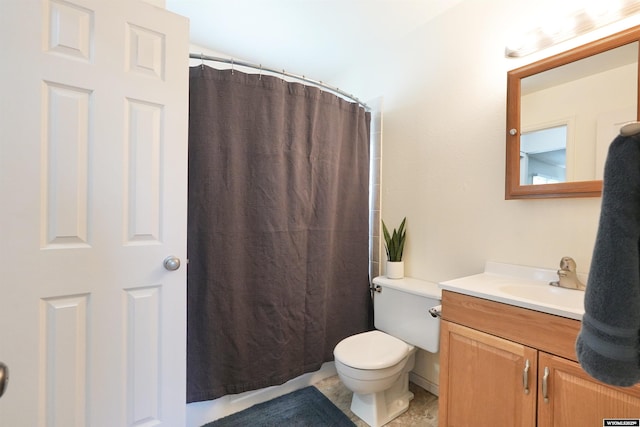 4451 S David St, Casper, WY 82601 - full bathroom with vanity, toilet, and a shower with shower curtain
