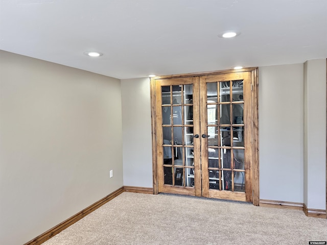 617 Lucille Cir, Evanston, WY 82930 - detailed view of carpet, french doors, baseboards, and recessed lighting