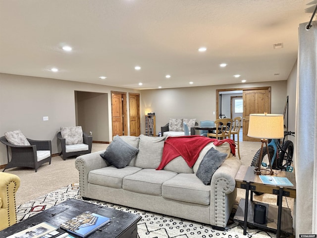 617 Lucille Cir, Evanston, WY 82930 - living area with recessed lighting and light colored carpet