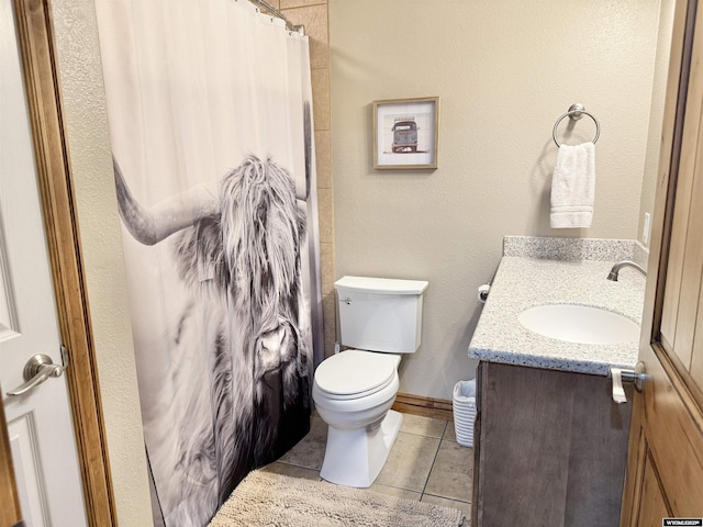 617 Lucille Cir, Evanston, WY 82930 - full bath with vanity, tile patterned floors, toilet, and a shower with curtain