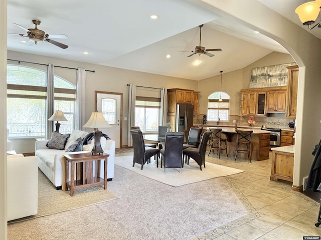 617 Lucille Cir, Evanston, WY 82930 - living area featuring ceiling fan, arched walkways, recessed lighting, and lofted ceiling