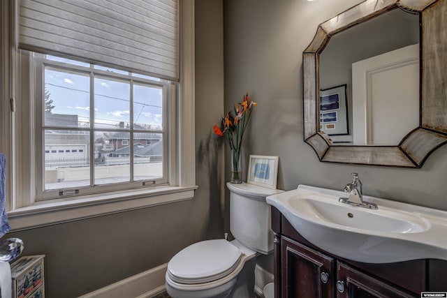 1108 S Wolcott St, Casper, WY 82601 - bathroom with plenty of natural light, vanity, and toilet