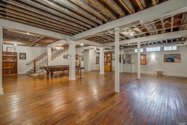 1108 S Wolcott St, Casper, WY 82601 - below grade area featuring hardwood / wood-style floors, stairs, and baseboards