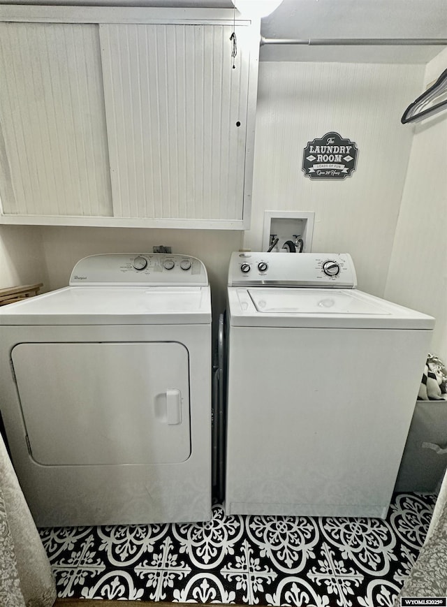 720 S 16th St, Worland, WY 82401 - washroom featuring washing machine and dryer and tile patterned floors