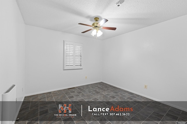 396 Williams Way, Glenrock, WY 82637 - unfurnished room with ceiling fan and a textured ceiling