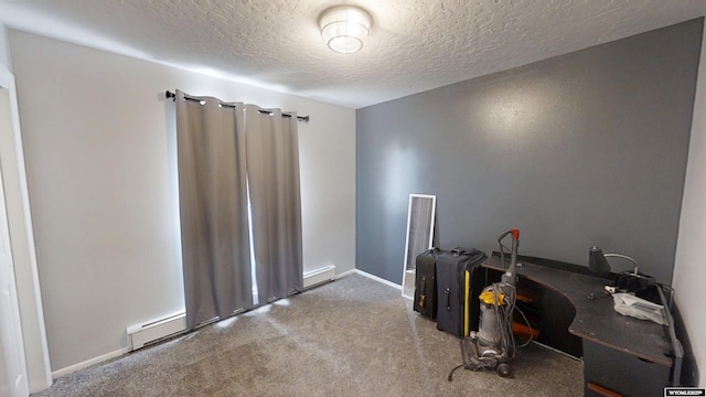 205 Daffodil, Casper, WY 82604 - carpeted home office with a textured ceiling, a baseboard heating unit, and baseboards