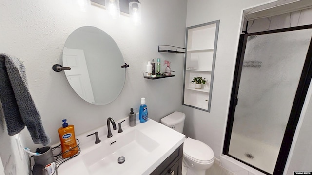 205 Daffodil, Casper, WY 82604 - full bathroom featuring a stall shower, toilet, and vanity