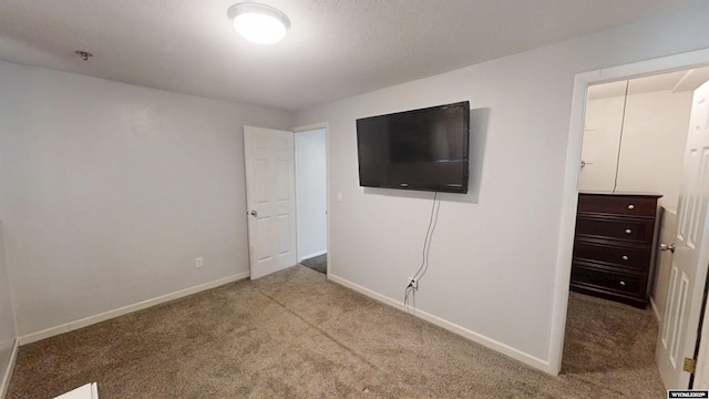 205 Daffodil, Casper, WY 82604 - unfurnished bedroom featuring carpet floors and baseboards