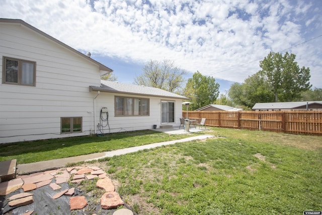 205 Daffodil, Casper, WY 82604 - back of property with a patio area