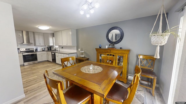 205 Daffodil, Casper, WY 82604 - dining room featuring light wood finished floors and baseboards
