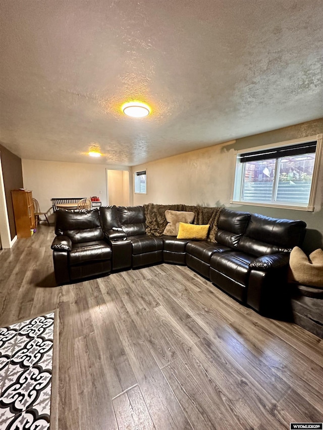1595 S Riverbend Dr, Green River, WY 82935 - living area with a textured ceiling and wood finished floors
