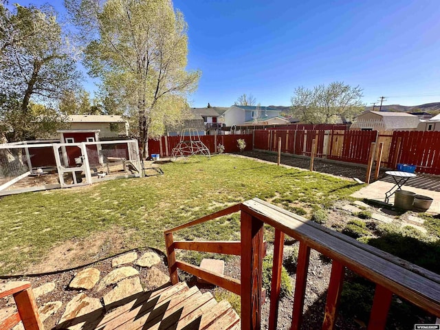 1595 S Riverbend Dr, Green River, WY 82935 - view of yard featuring exterior structure and an outdoor structure
