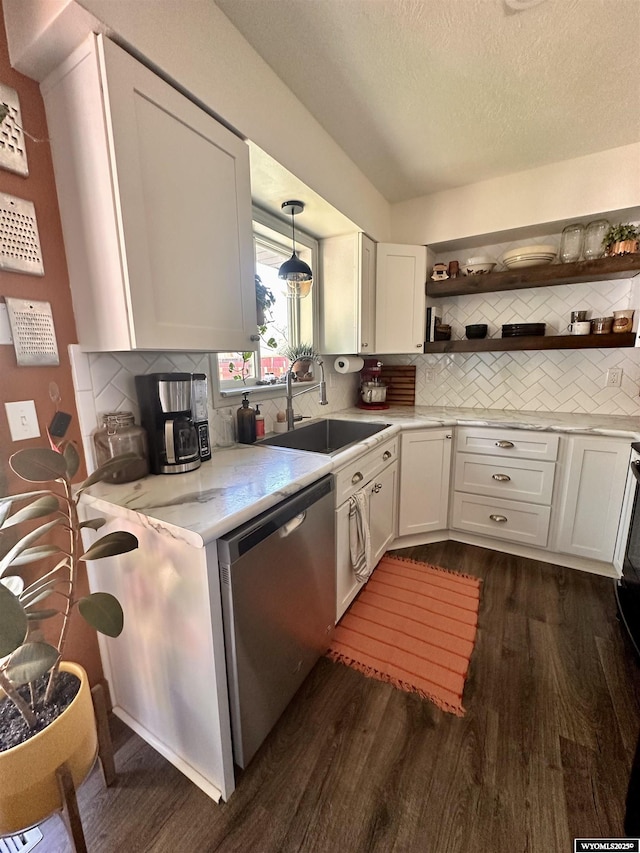 1595 S Riverbend Dr, Green River, WY 82935 - kitchen with stainless steel dishwasher, a sink, open shelves, dark wood-type flooring, and a textured ceiling