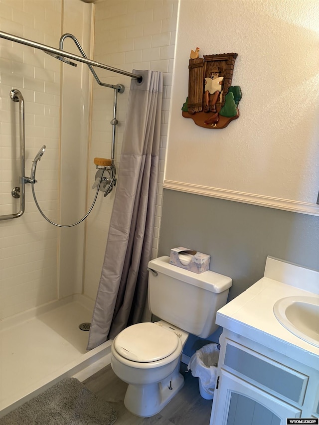 715 Emerald St, Kemmerer, WY 83101 - bathroom featuring toilet, a shower stall, and vanity
