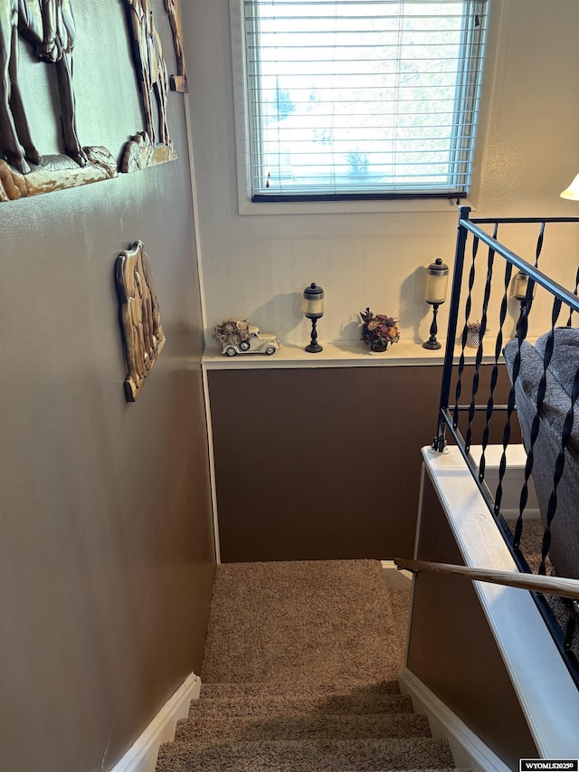 715 Emerald St, Kemmerer, WY 83101 - staircase with carpet and healthy amount of natural light