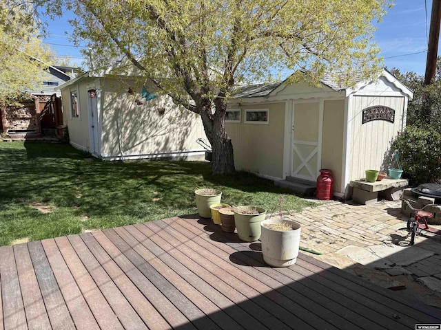 715 Emerald St, Kemmerer, WY 83101 - wooden deck with a lawn and a patio