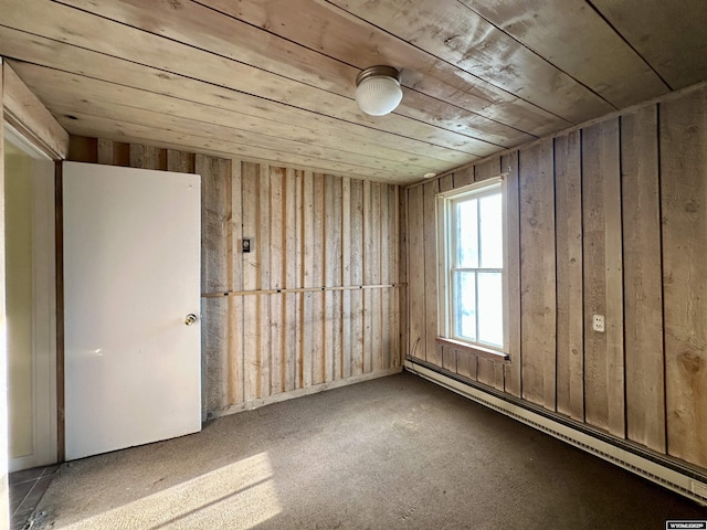 596 Garfield St, Lander, WY 82520 - carpeted spare room with a baseboard radiator and wooden ceiling