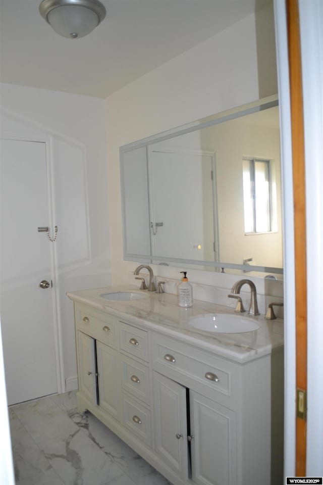 104 First St, Mountain View, WY 82939 - full bath with double vanity and marble finish floors