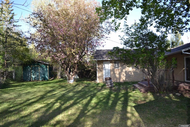 104 First St, Mountain View, WY 82939 - view of grassy yard with a wooden deck