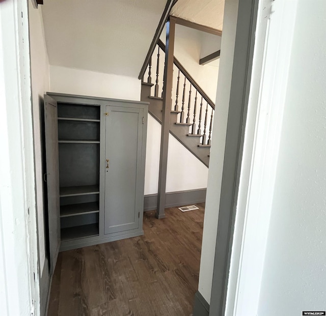 1137 Main St, Evanston, WY 82930 - stairs featuring wood finished floors and baseboards