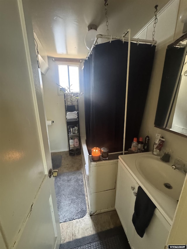 1137 Main St, Evanston, WY 82930 - full bathroom with vanity and a shower with shower curtain