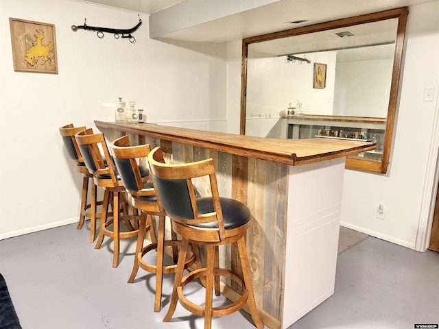 921 3RD W Ave, Kemmerer, WY 83101 - indoor dry bar with concrete floors and baseboards